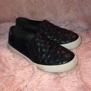 Black Guess slip ons